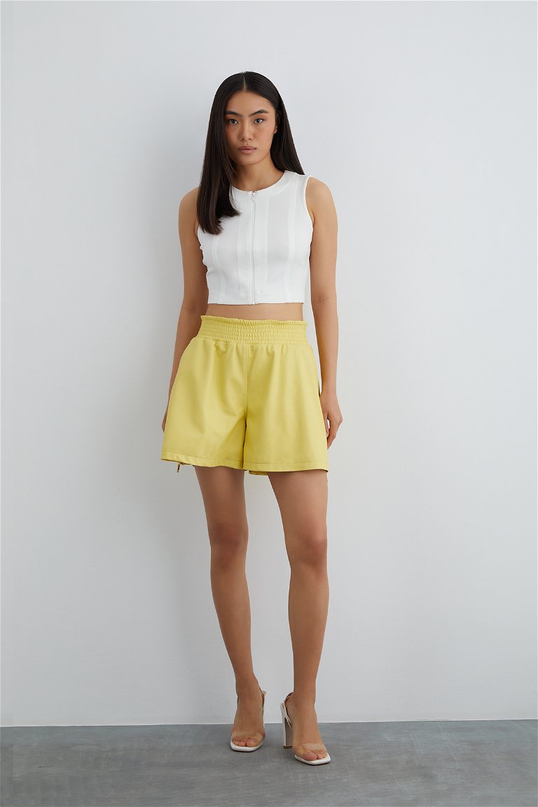 GIZIA - Yellow Leather Shorts With Elastic Waist and Side Zipper Slits